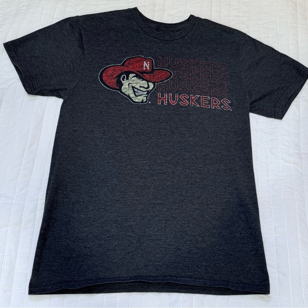 Rivalry Threads Huskers Women’s Charcoal T-Shirt featuring Herbie Husker Sz S